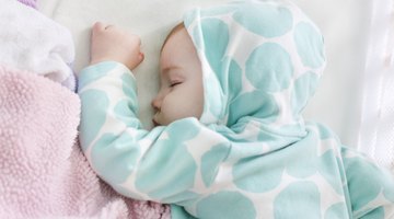Beautiful innocent newborn sleeping.