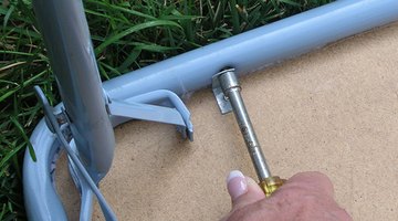 Remove the screws from the table frame.