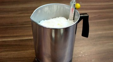 Place wax flakes in the pouring pitcher