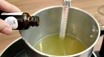Add fragrance to melted wax
