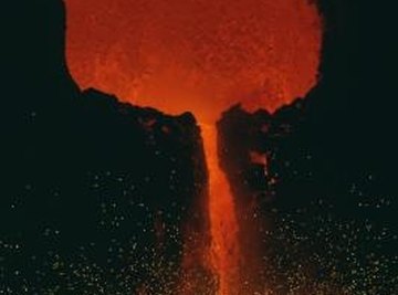 Volcanoes spew ash, lava and several gases when they erupt.