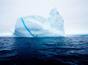 Sea ice floats because the salt water beneath it is denser.