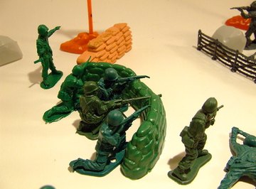 Use toy army figures to enhance the battlefield scene.
