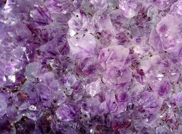 What causes some clear glass to turn purple?  Hint: It's not magic.