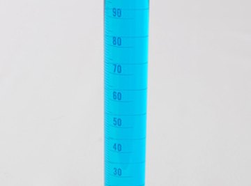 A graduated cylinder facilitates the measuring of a liquid's volume.