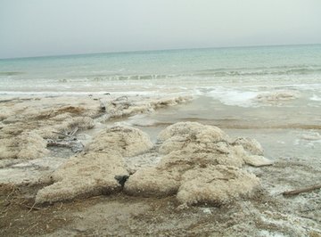 The formation of rock salt begins at the edge of a body of saltwater.