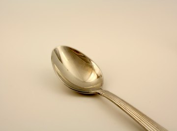 Spoons are used to demonstrate Bernoulli's principle with dry ice.