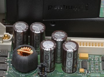 Electrolytic capacitors in a circuit board.