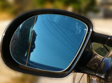 Mirrors are found on vehicles because they improve line of sight.