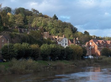 River soil can be carried from mountains and deposited in freshwater lakes.