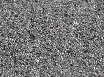 Pumice is a rough and lightweight porous rock formed from magma during volcanic eruptions.