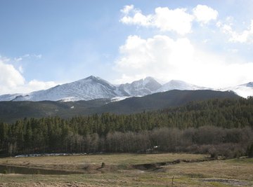The Rocky Mountains are a popular tourist attraction for snowboarders and skiers.