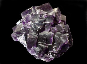 Fluorite is a mineral that commonly glows under UV light.