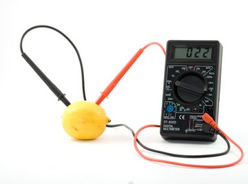 A lemon hooked up to a voltmeter