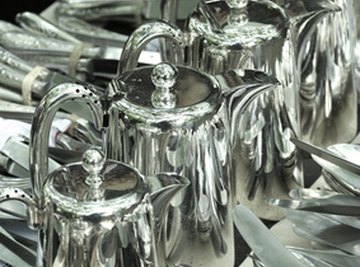 Silver coffeepots and flatware.