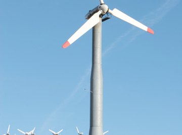 A wind turbine is a device that uses both electricity and magnets.