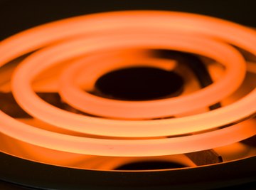 A glowing electric stove element heated by an internal nichrome wire.