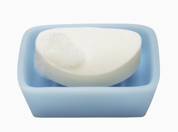 Soap is the result of hydrolysis between a fat and a base.