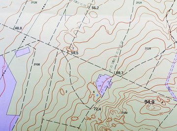 A close-up of circles and lines on a topographic map.
