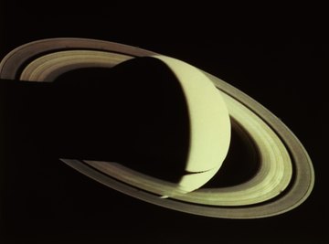 Saturn's visual albedo is 128 percent that of Earth.