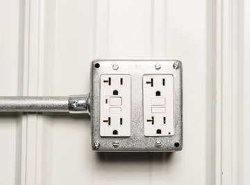 Electrical outlet on wall.