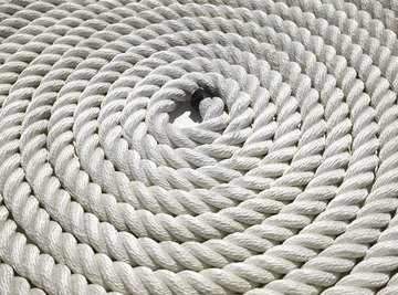 Coils of thick rope in a spiral pattern. Large rope texture on a