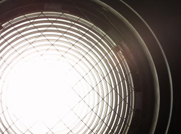 A Fresnel lens focuses sunlight effectively with a short focal length.