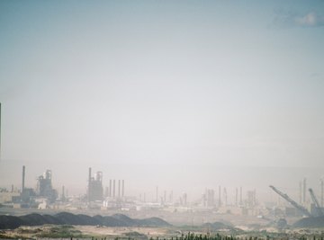 Smog settles over an industrial park.