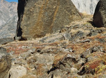 Chemical weathering can leave rust-colored streaks and other discolorations on rocks.