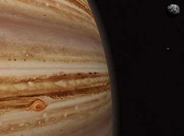 Jupiter gets its striking banded appearance from chemical clouds buffeted by wind currents.