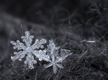 These snowflakes show dendritic, or branching, form.