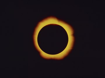 A total solar eclipse occurs when the moon completely blocks out the sun.