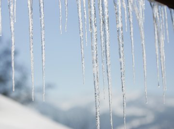 Ice from freezing rain increases the weight of branches, causing them to break off.