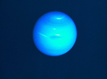 Neptune with clouds and Great Dark Spot, as viewed from Voyager 2.