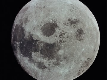 The entire face of the moon is visible during the full moon.