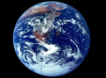 The thickness of the Earth's atmosphere varies with geographical location.