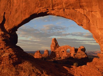 Weathering is a primary tool for scouring out natural rock arches.