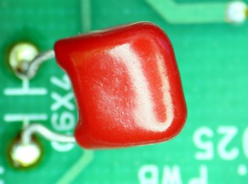 Ceramic capacitors hold electric charges on plates separated by insulators.
