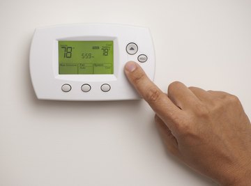 A home thermostat includes a thermistor exposed to the room air.