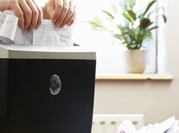 It's best to shred personal documents before recycling them.