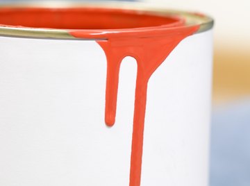 Painting your rain barrels a dark color helps prevent algae growth.