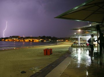 People taking shelter from a storm near the beach.