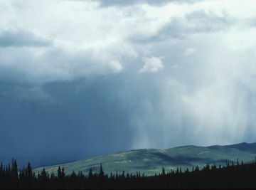 Rain shadows develop in areas shielded from prevailing winds by mountains.