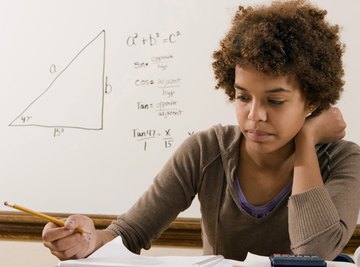 Young student studying geometry