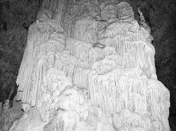 Limestone, rich in calcite, is susceptible to dissolution -- a form of chemical weathering.