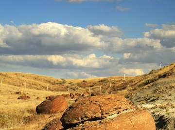 Rocks in arid environments expand and crack when heated.