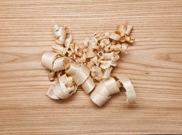 An overhead view of of piece of ash wood and shavings.