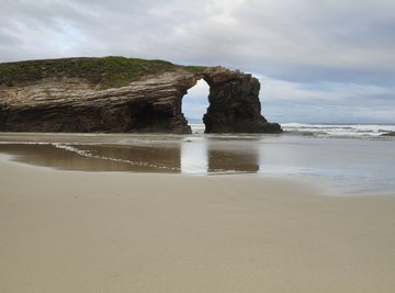 Land formations created by erosion on a beach in Spain.