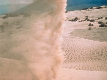 Dangerous desert sandstorms and dust storms can cover large areas.