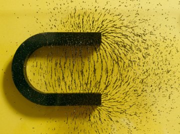 Iron filings show the magnetic field surrounding a magnet.